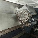 同款兩臺紐威NL504SC，兩軸硬軌，回轉直徑600mm，切削.